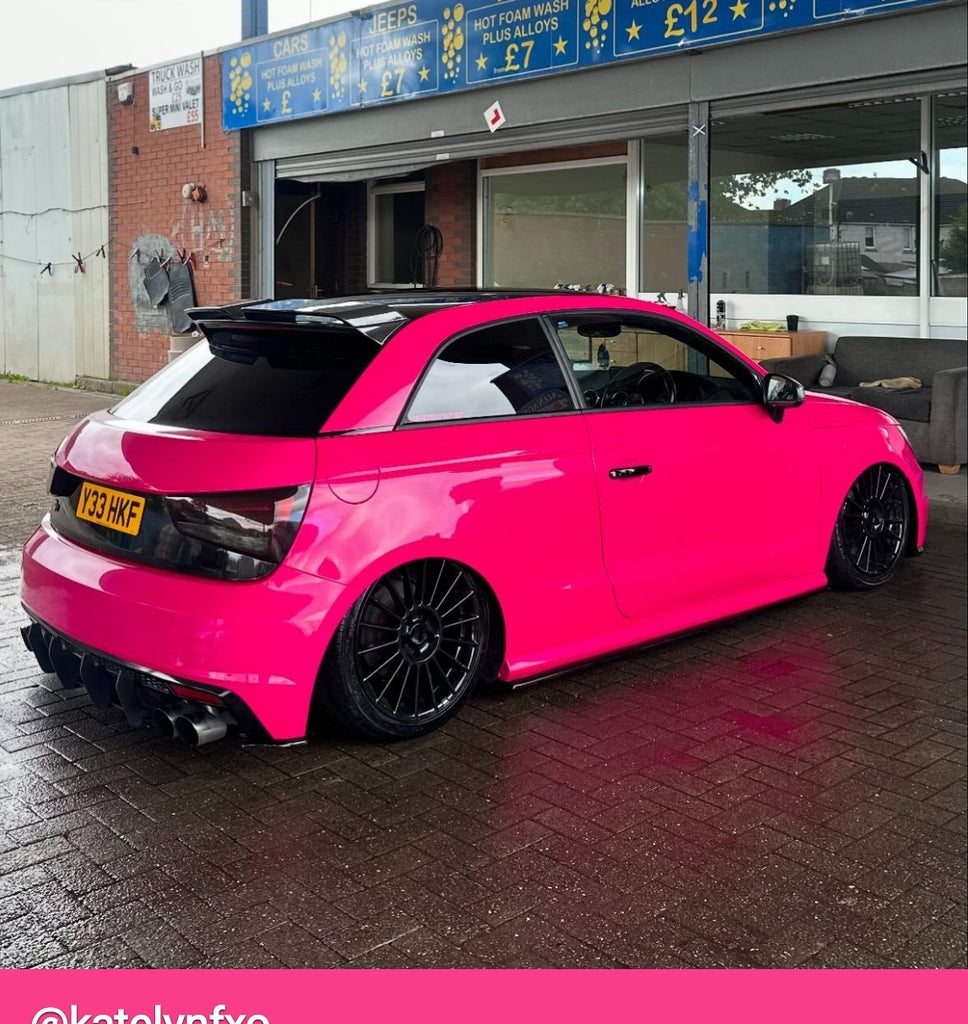 Pink Audi S1 with some short number plates