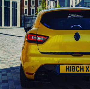 Liquid yellow Renault Clio RS with some 3D gel plates