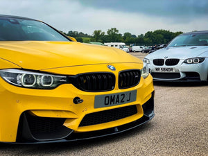 Yellow BMW M4 with some tinted 3D gel plates
