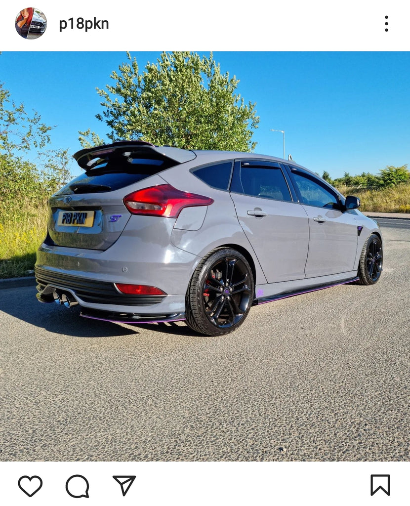 Grey Ford Focus ST with some short 4D gel plates