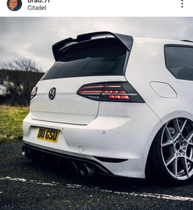 Bagged VW Golf R with some legal 4D plates
